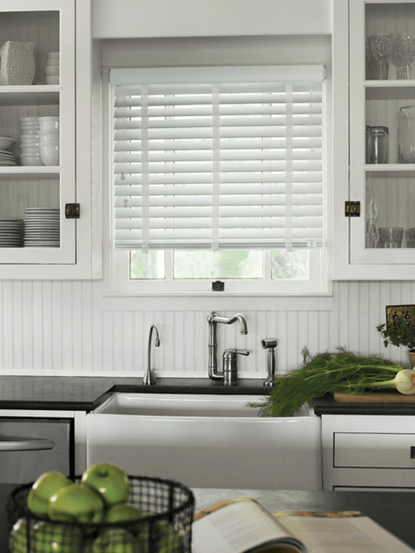 Faux wood blinds in kitchen