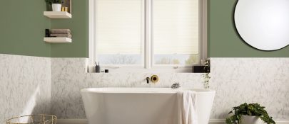cream perfect fit blinds in bathroom with green wall