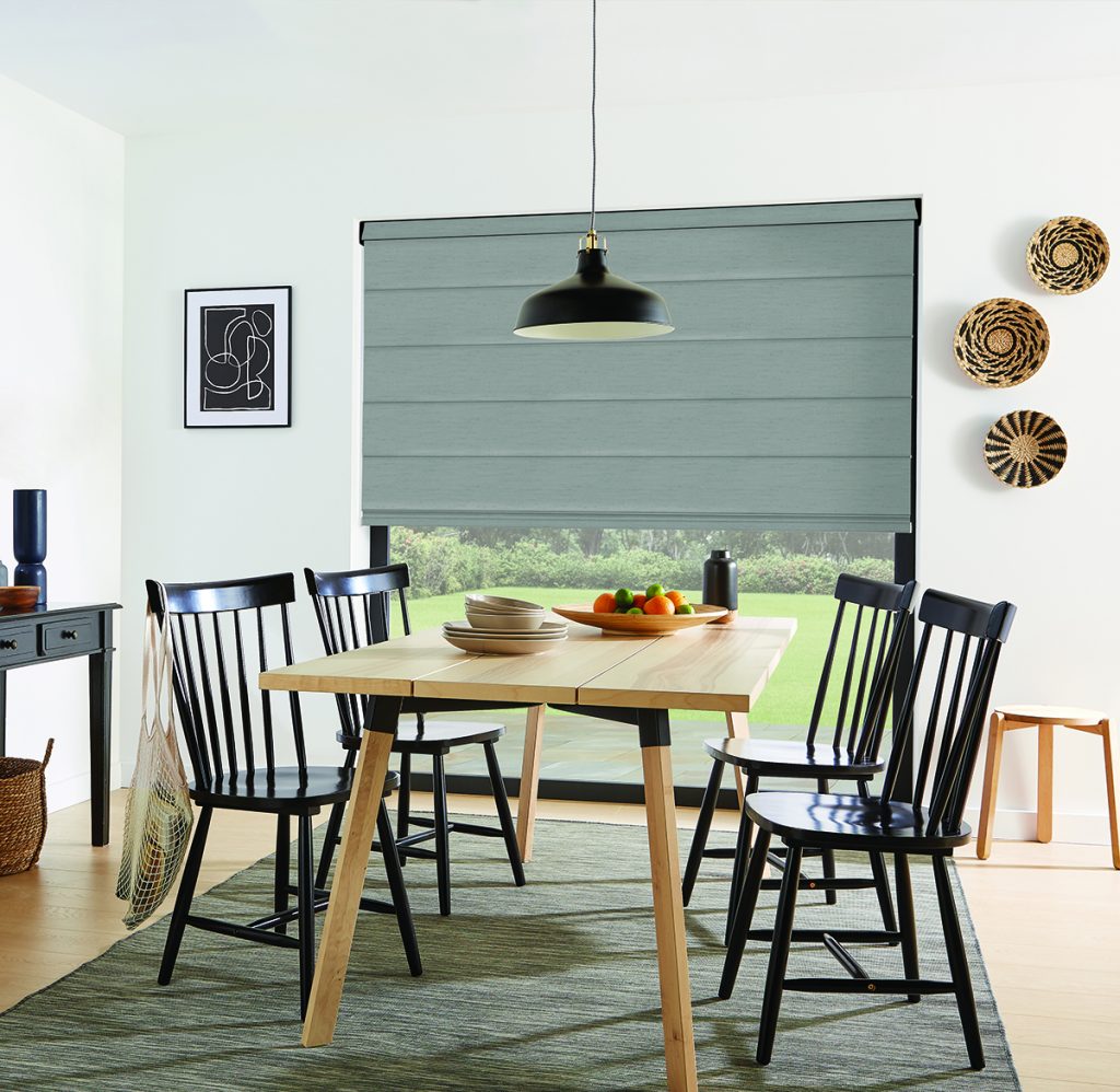 blue roman blinds in dining area